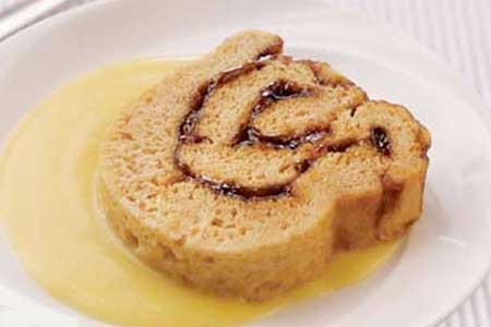 Jam rolly polly in custard